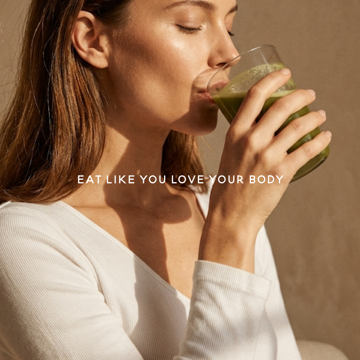 Stylized blue and pink image of a whiskey glass with the wordmark of Vèloce in pink all-caps letters above.